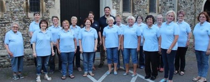 Here we are in our choir t-shirts, taken over 3 years ago, so you can see how many choir members we used to have.
